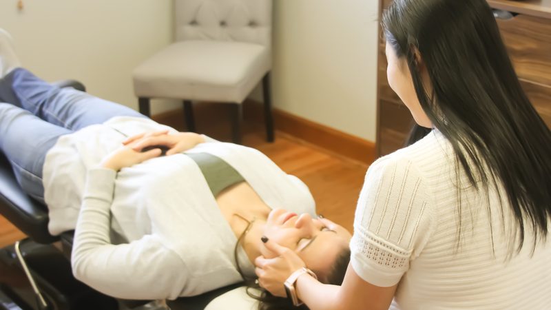 An Integrated Chiropractic and Wellness doctor adjusting a patient in Fulshear, TX